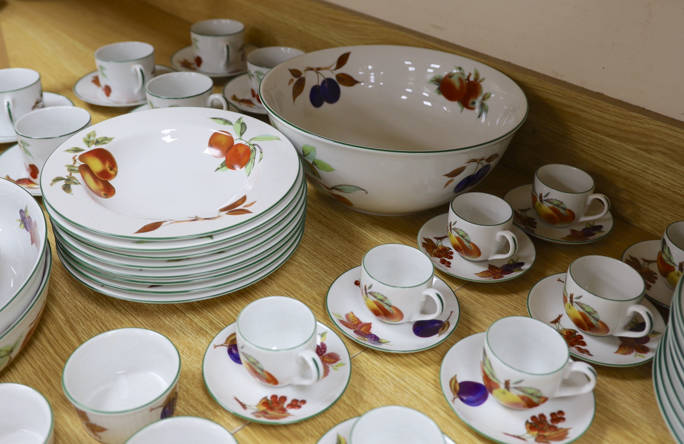 A large quantity of Royal Worcester Evesham Vale serving dishes and dinnerwares